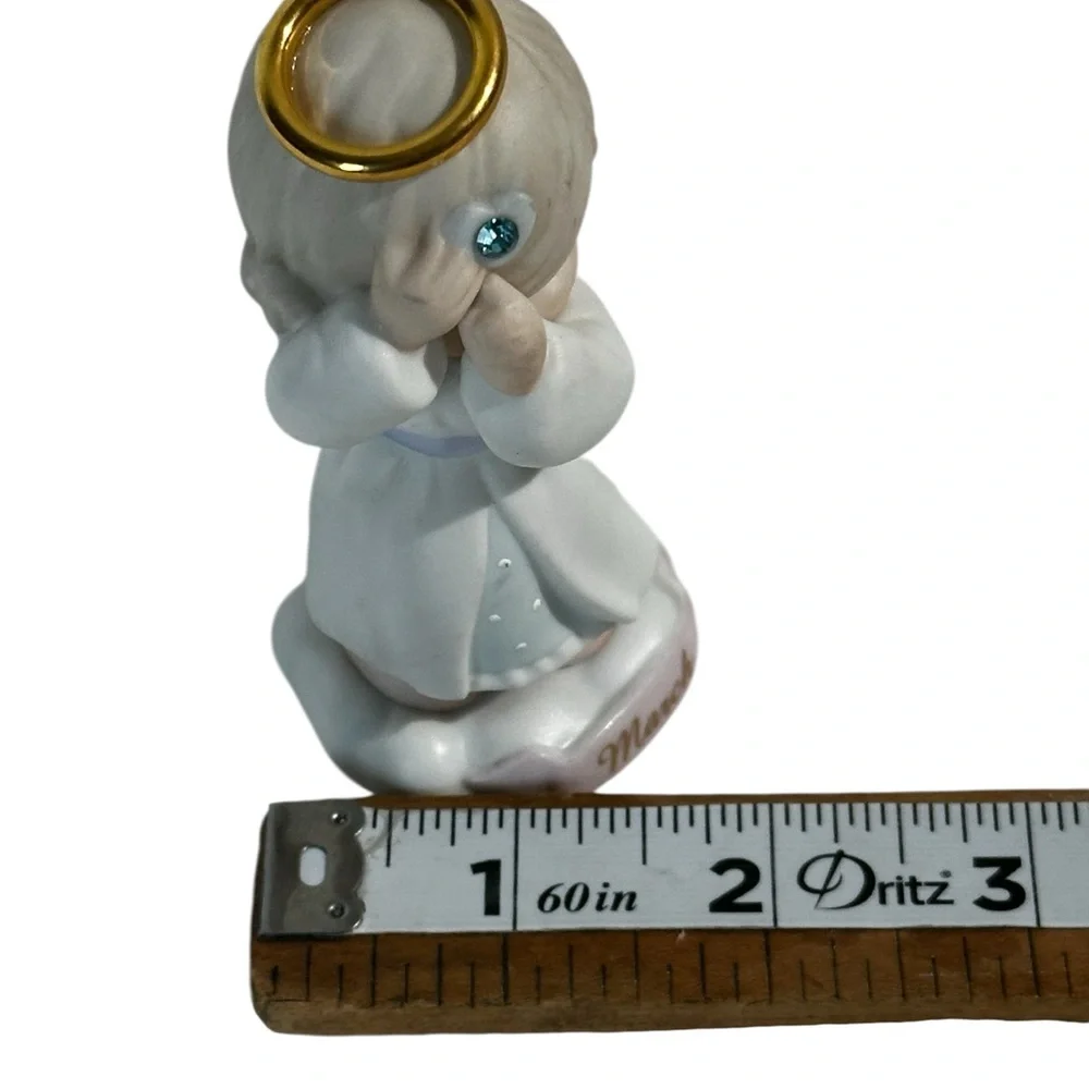 Precious Moments March Angel Figurine - White and Cream